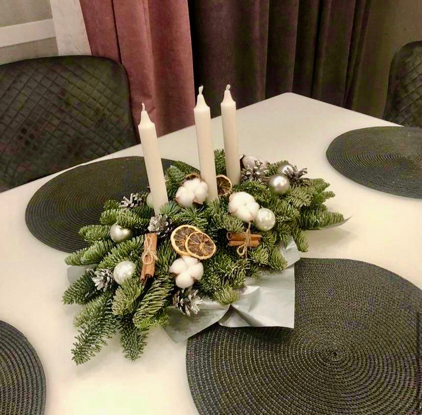 Elegant White Christmas Centerpiece with Natural Accents and candles