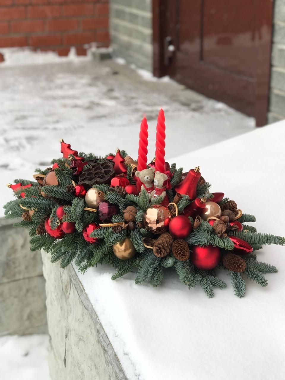 Festive Red and Gold Christmas Centerpiece with Candles and Pinecones