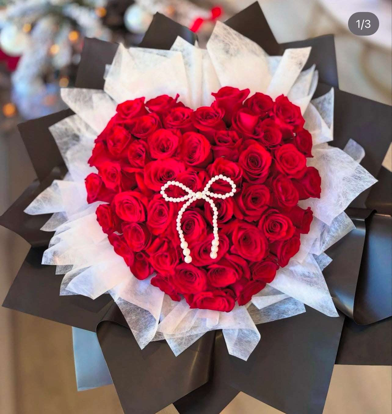 Elegant Heart-Shaped Red Rose Arrangement with Pearl Bow