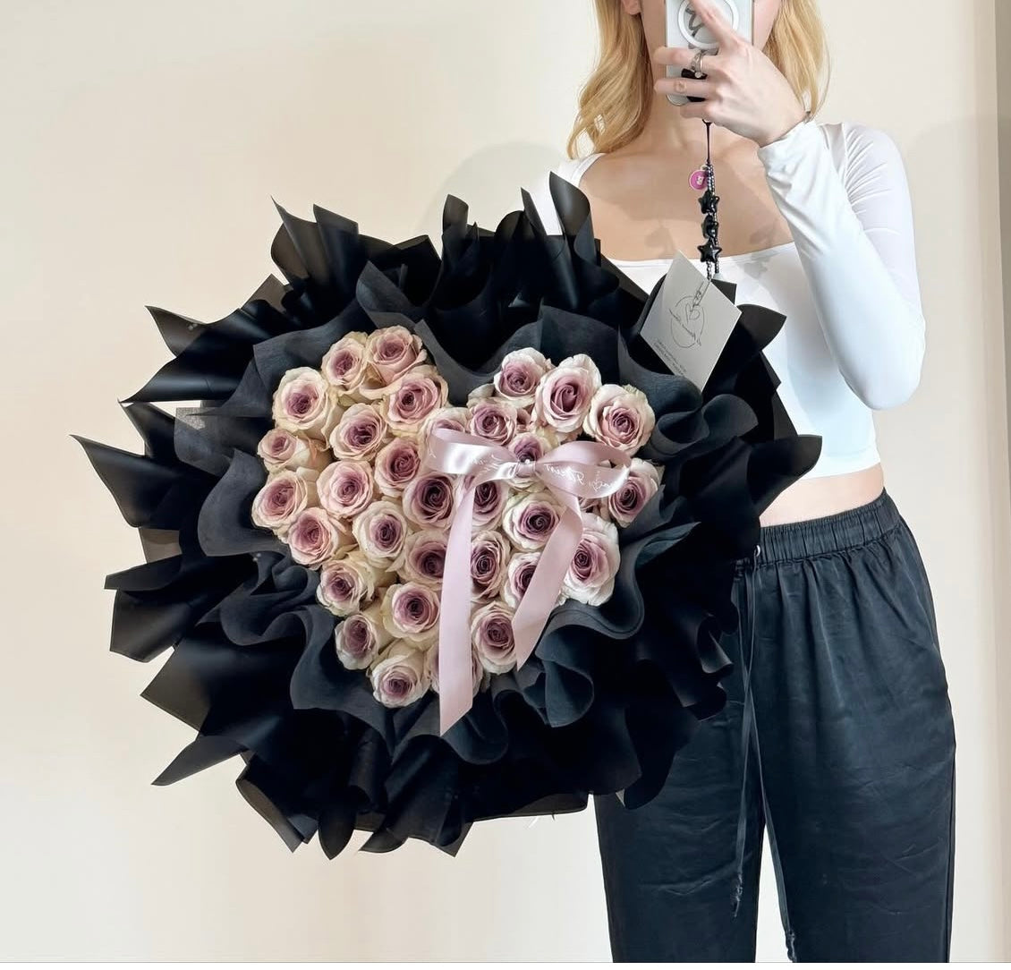 La Fleur Chanel - Heart shaped spray coloured roses.