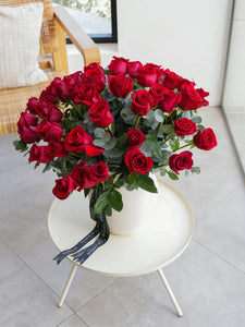 50 roses in a vase