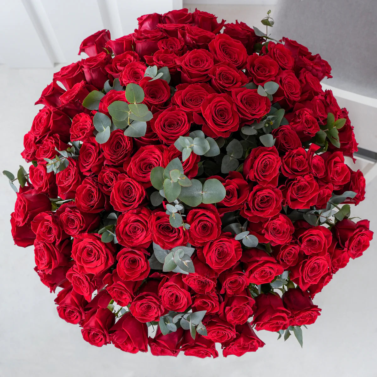 Valentines 100 red roses in a vase - Floral Fashion Boutique