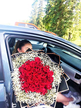 Load image into Gallery viewer, Red roses with baby breath
