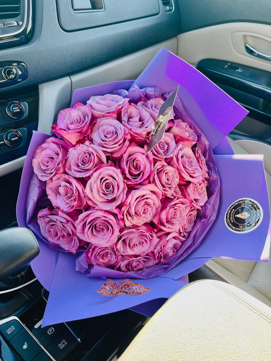 25 lilac roses